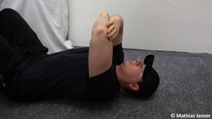 Übungen gegen Schmerzen in der Schulter - Ausgangsstellung des Duoballs